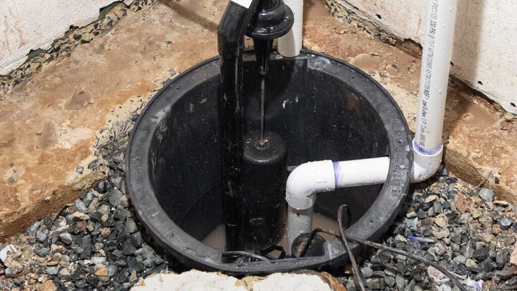 Replacement sump pump installed by Dry Tech Waterproofing Solutions