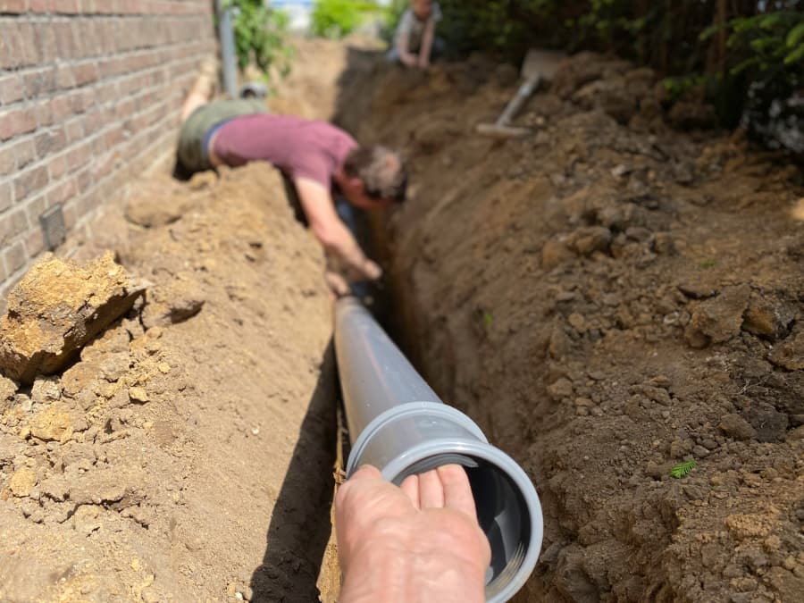 Trench drain being installed
