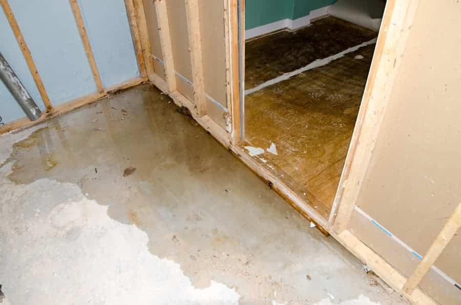 Basement rooms with water on floors